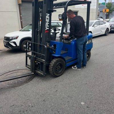 Customer Ethan Harmon with excavator